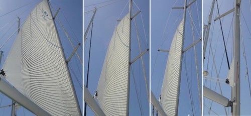 The finished sail with its roach and vertical battens rolling into the mast © SW